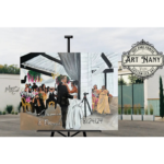 Artist creating live wedding painting on site