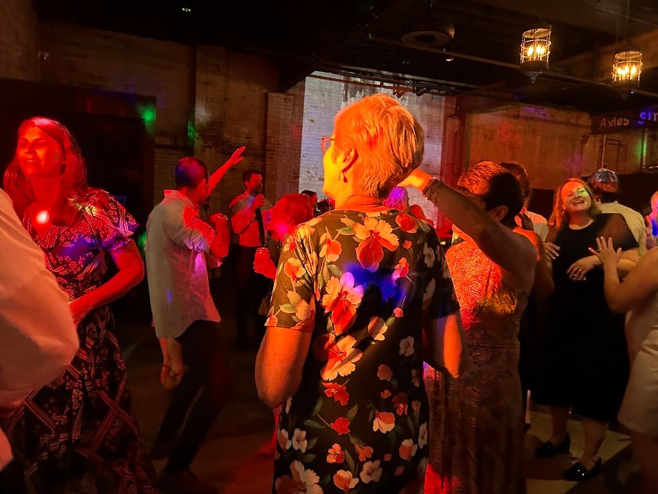 Guests dancing during a wedding reception with DJ Spyder Beats