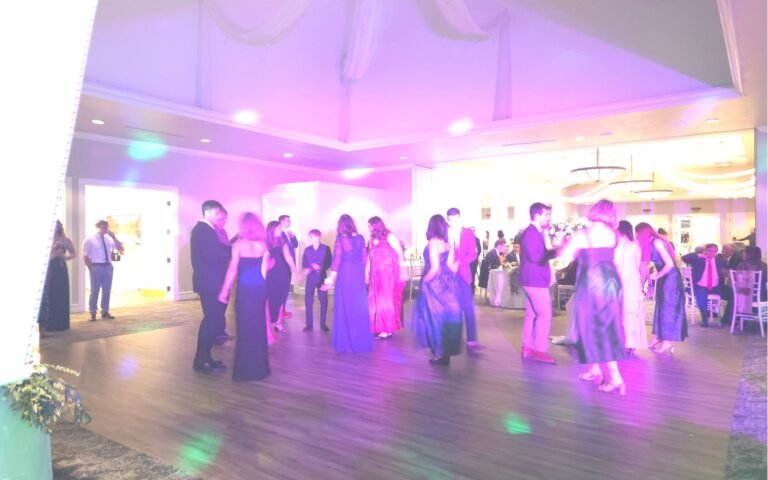 Wedding reception guests enjoying DJ music at The Hawthorns