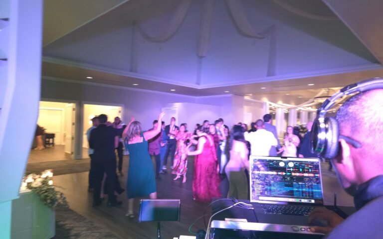 Wedding guests dancing at The Hawthorns Country Club