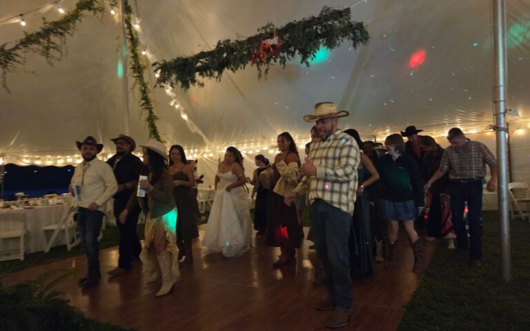 Weddong guests dancing during a reception with DJ Spyder Beats