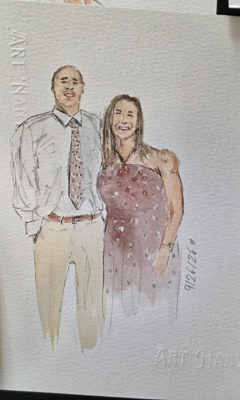 Artist creating personalized watercolor portraits during a wedding
