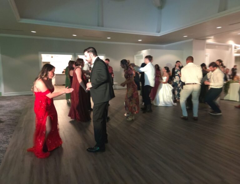Professional DJ controller and audio equipment at a wedding
