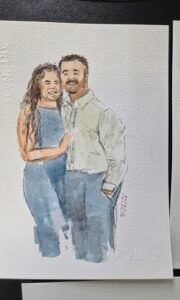 Live watercolor couple portraits for wedding guests